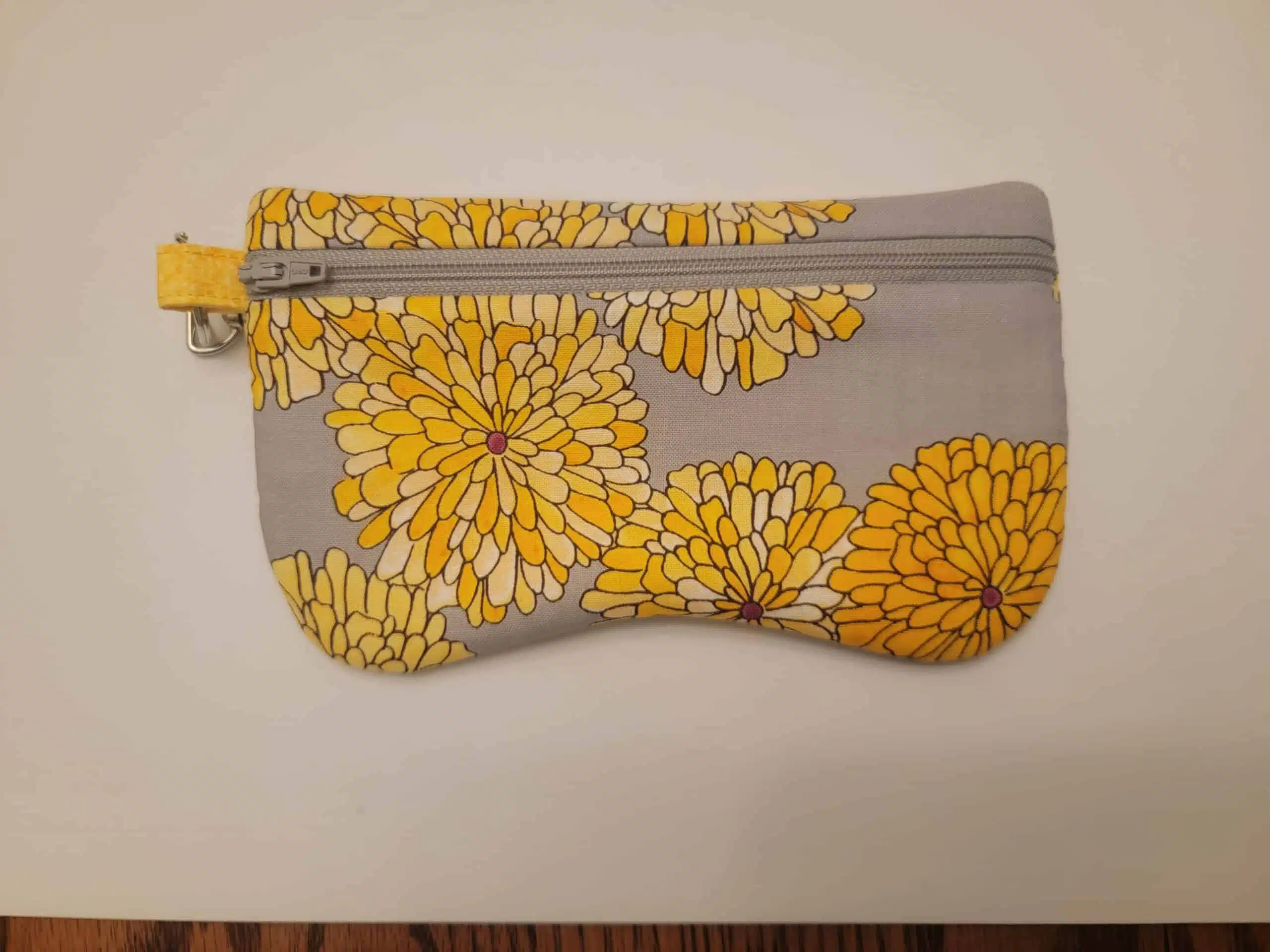 Glasses case with sunflowers on grey material